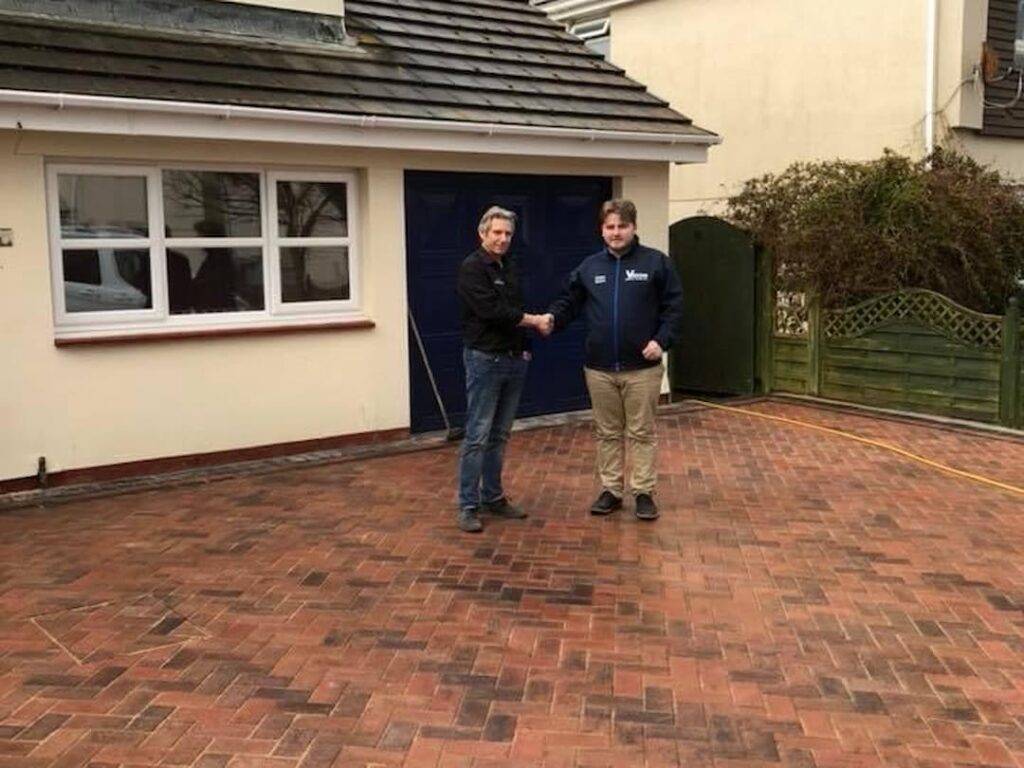 Shaking hands On Driveway